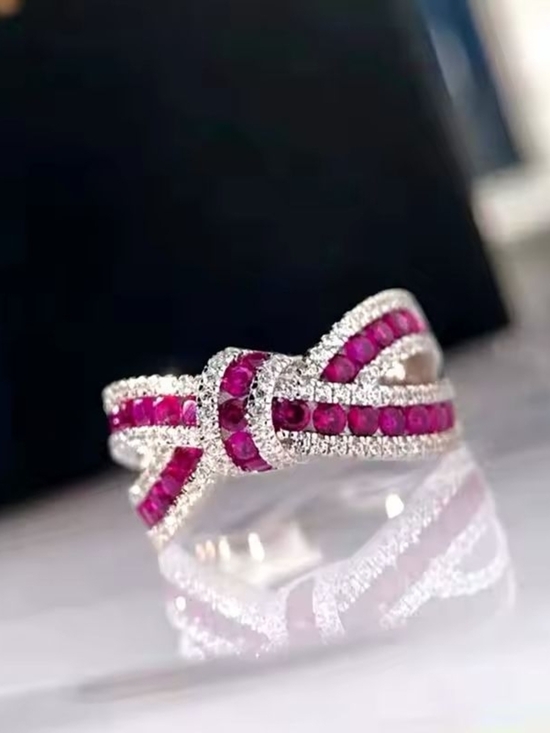 Anthropologie Jewelry - Silver Ring with Vivid Pink Gem Bow